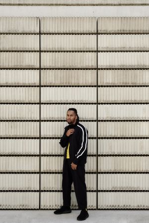 Black male near concrete blocks