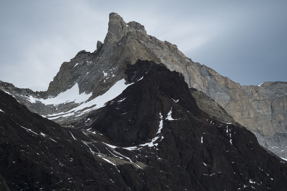 Mountain peak abutting sky in desert valley