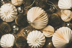 Gold and cream folded tree ornaments, and baubles