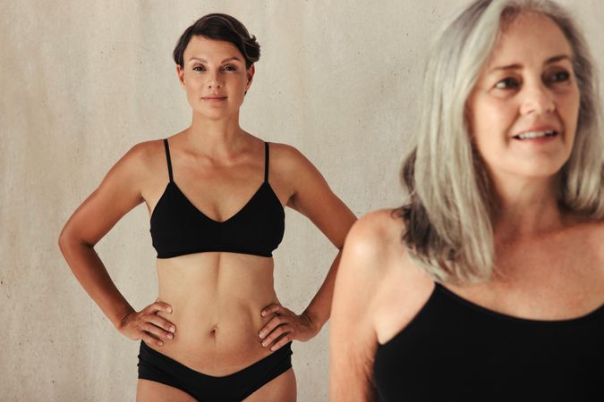 Women of different ages posing confidently in their natural bodies