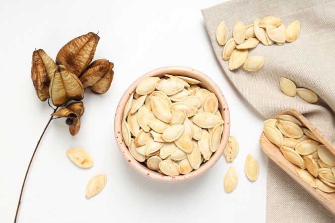 Cooking ingredients for fall season - pumpkin seeds, pumpkin