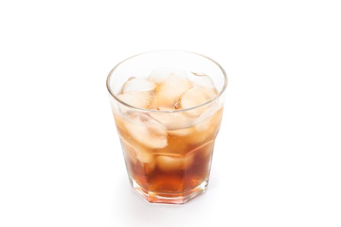 Glass of cold cola isolated on blank background