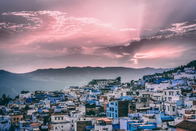 Cityscape of blue city Chefchaouen, Morocco at sunset