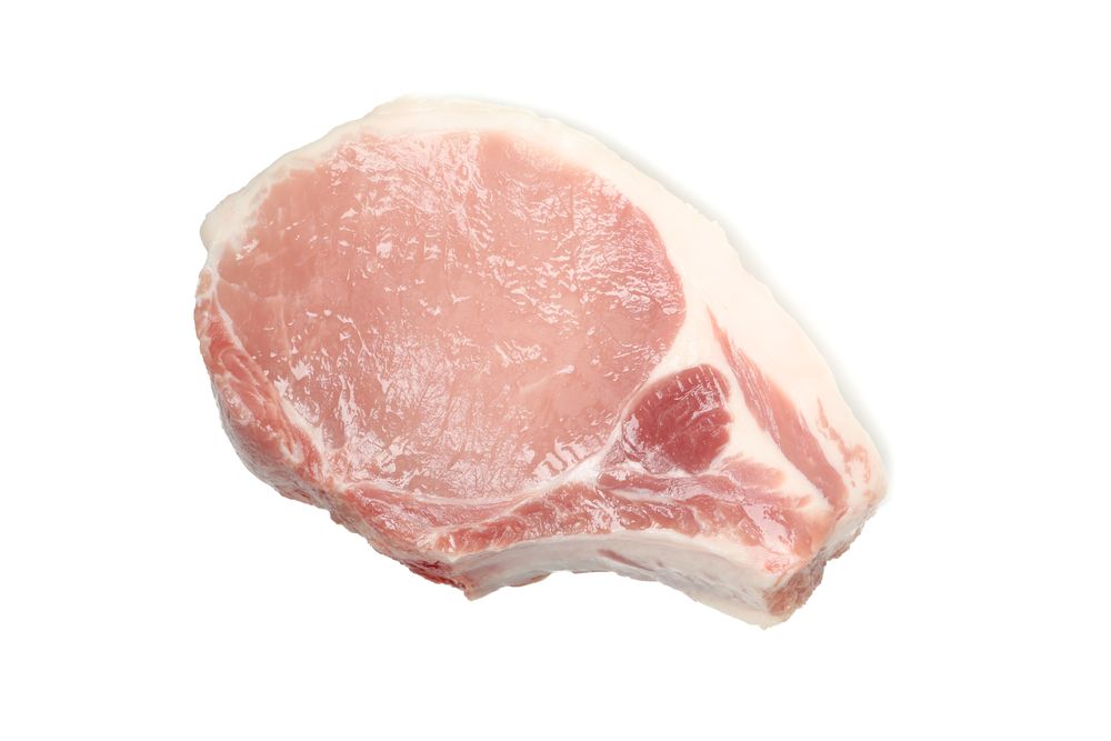 Raw meat for steak isolated on light background