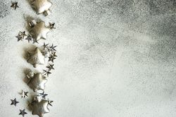 Festive Christmas card concept with silver star shaped decor