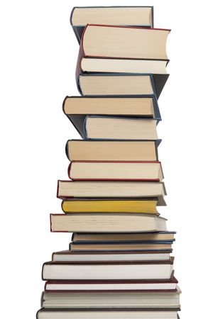 Pile of books stacked isolated on a studio background  in a vertical image