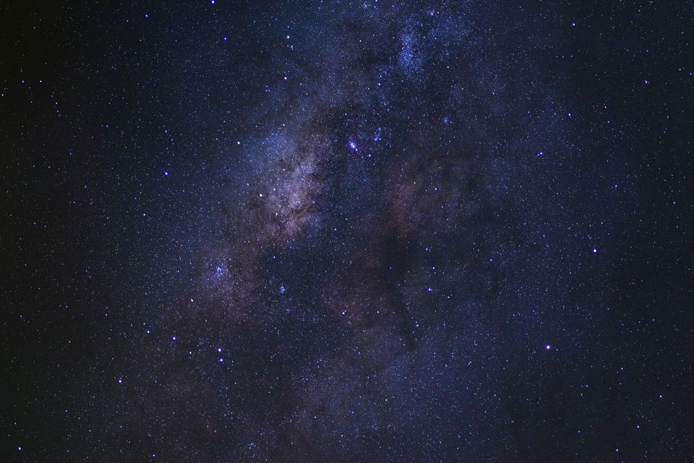 Starry night sky and milky way galaxy with stars and space dust in the universe
