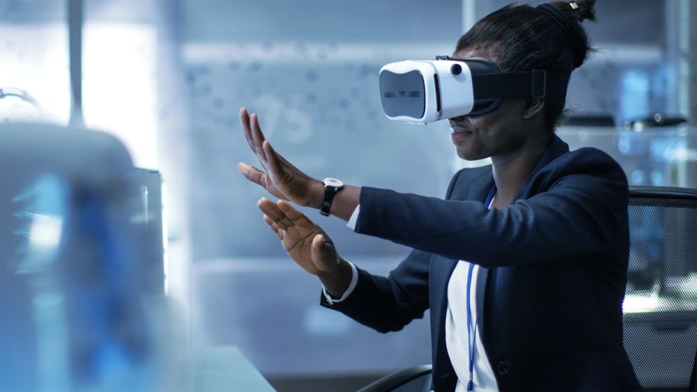 Female Virtual Reality Engineer Alone in a Modern Laboratory