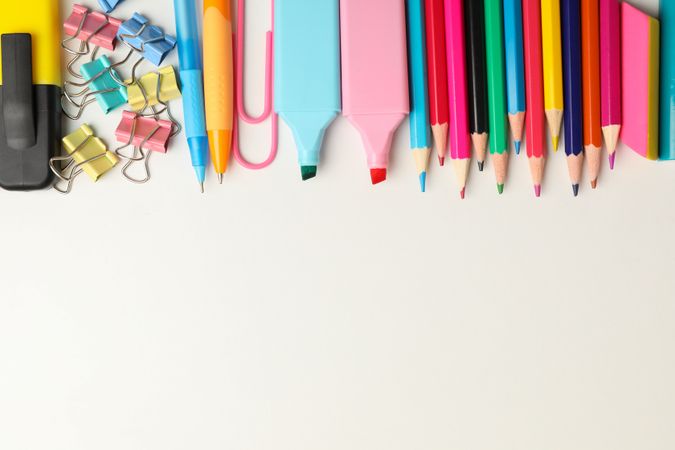 Frame of school supplies on blank background, space for text