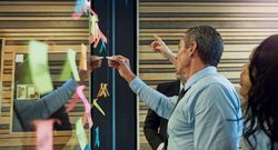 Diverse team of business people brainstorming in a modern office