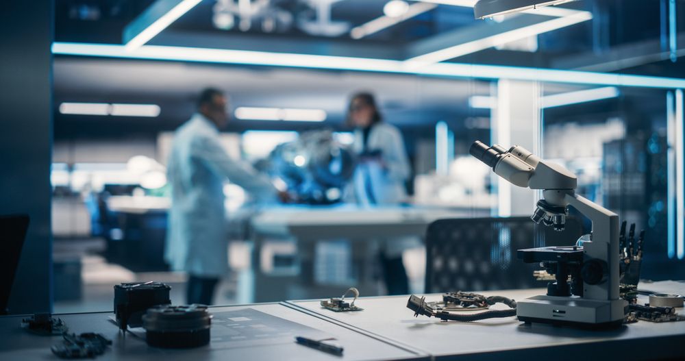 Workplace with a Modern Digital Microscope in a Research and Development Facility.