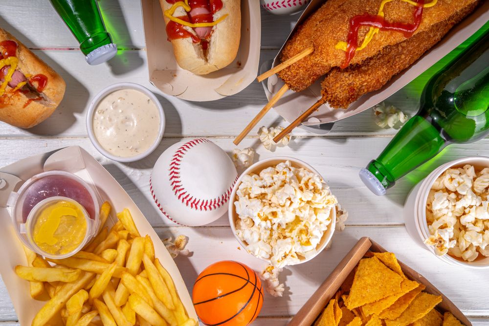 Traditional sport stadium foods and beer background