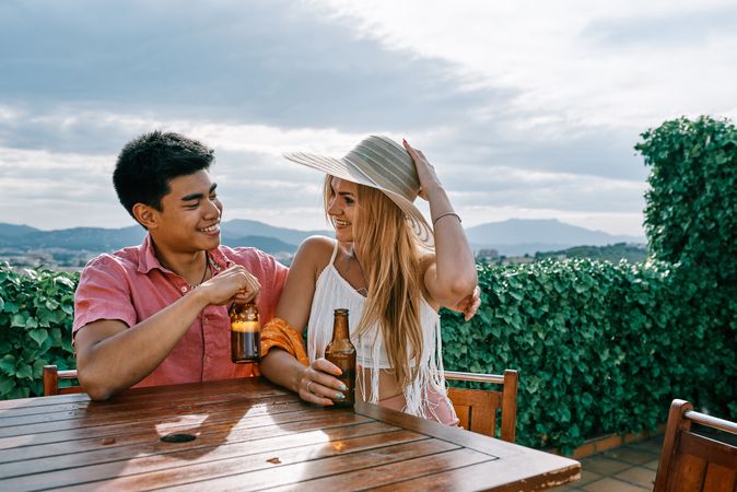 A woman and man in love drinking