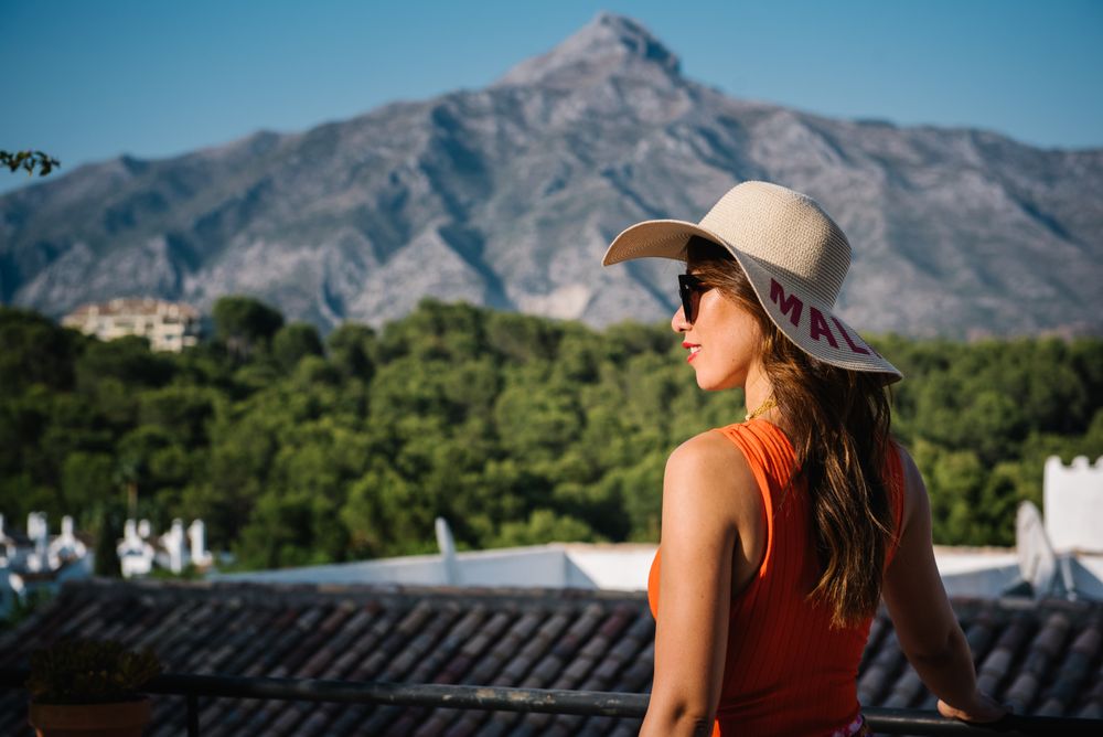 young elegant Asian woman at mediterranean scenario