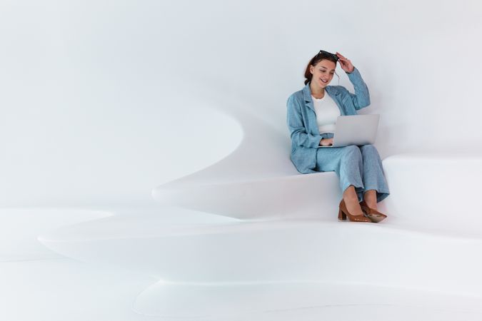 Woman browsing on laptop