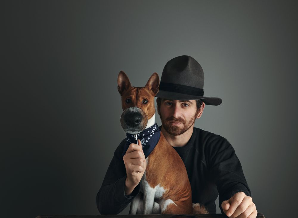 Vintage magnifyer in hand magnify dog nose