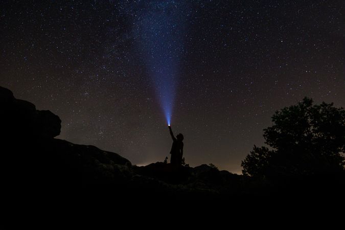 Night sky with the silhouette of a man