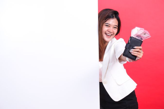 Woman with wallet and money
