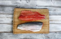 Rainbow trout fillet reversed on bamboo board
