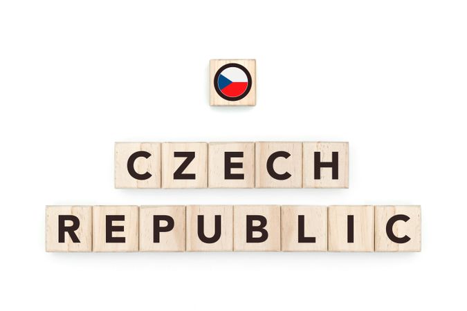 Wooden blocks bearing the name and flag of Czech Republic. Czech and European Culture, national identity, travel, and geography in a copy space design.