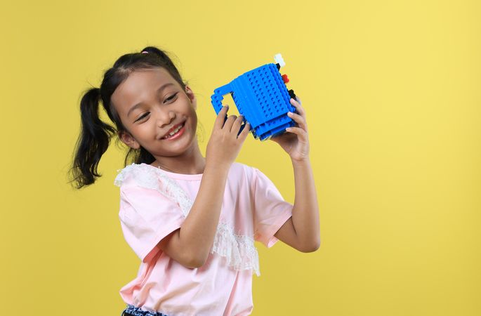 Asian Girl Kids Drink Water from Blue Cute Cup