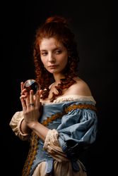 Baroque woman with glass ball