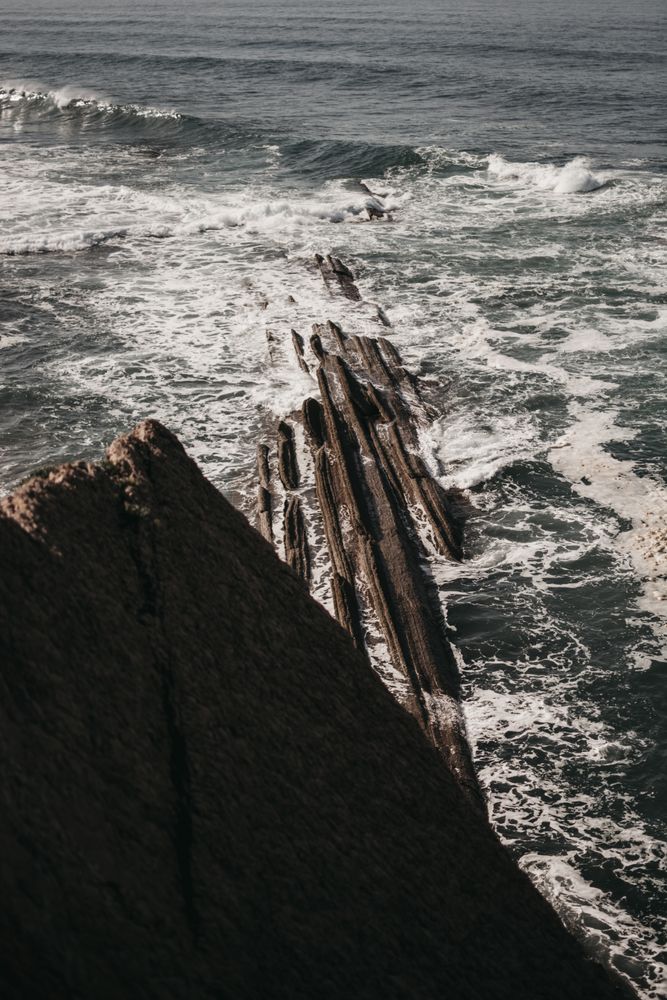 Cliff near stormy sea