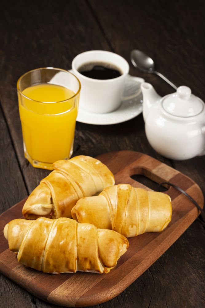 Traditional fresh baked croissants on the table.
