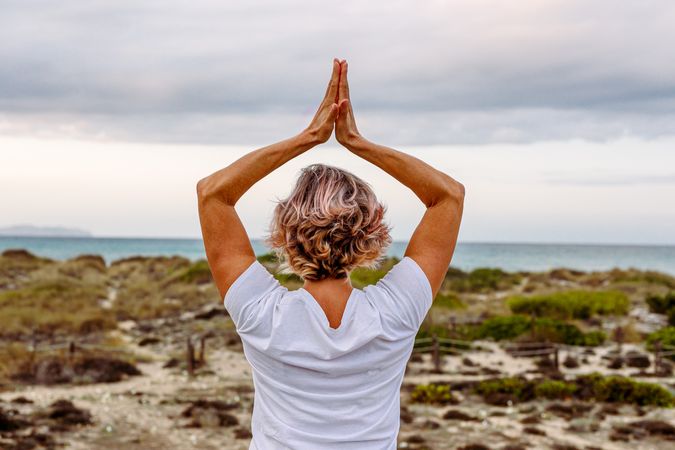 Adult woman practicing martial arts in nature