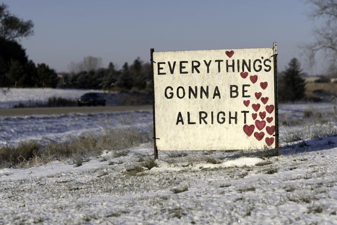 Inspiration sign with hearts in a cold field