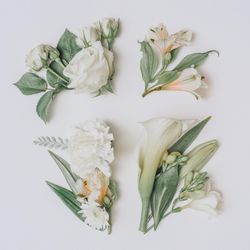 Easter layout with flowers and leaves in cross shape on light paper background
