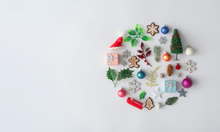 Flat lay of Christmas cookies and decorations in circle