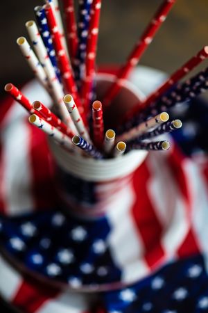 Close up of American flag plates, napkins and straws for July 4th