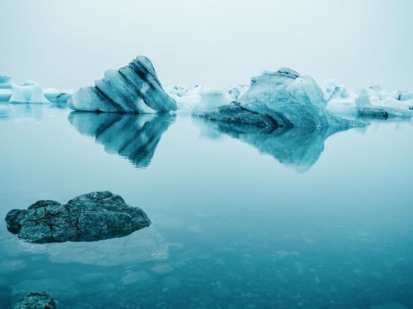 Ice on water between snow
