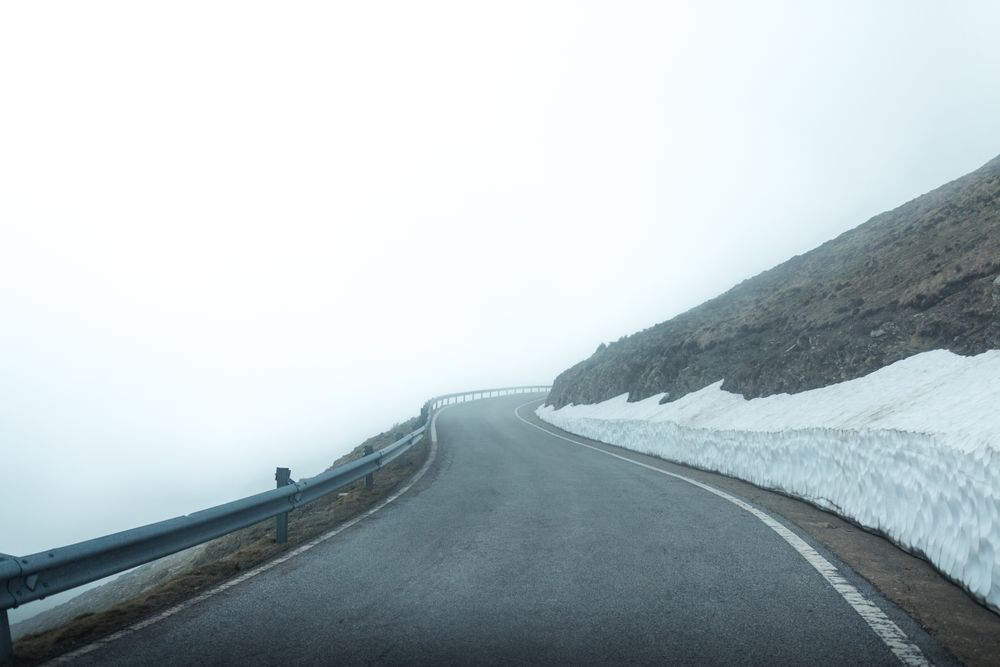 Road in foggy mountains