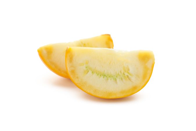 Fresh zucchini slices isolated on blank background