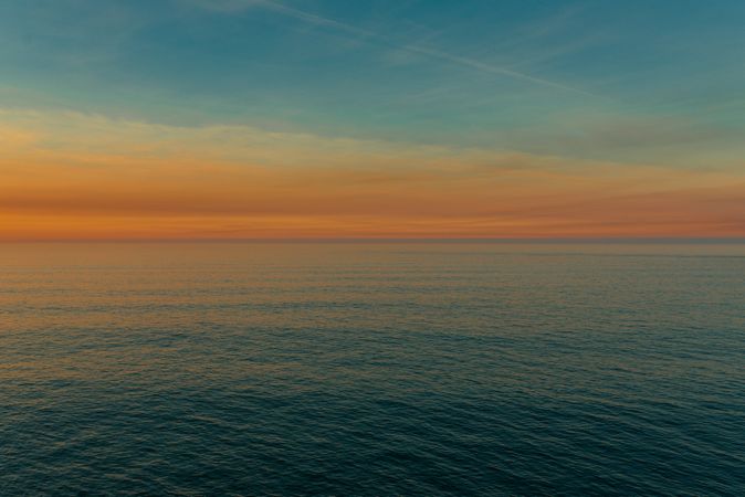 Peaceful endless ocean in sunset