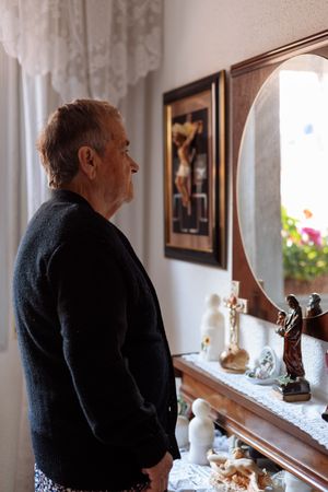 mature woman looking in the mirror