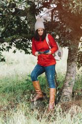 Female traveler with guide in countryside