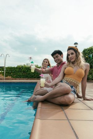 Group of friends having a pool party