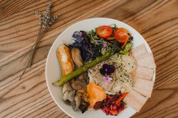 Appetizing vegetable and bread snacks on plate