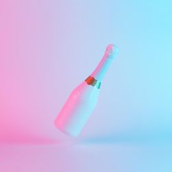 Champagne bottle with colorful ultraviolet holographic neon lights