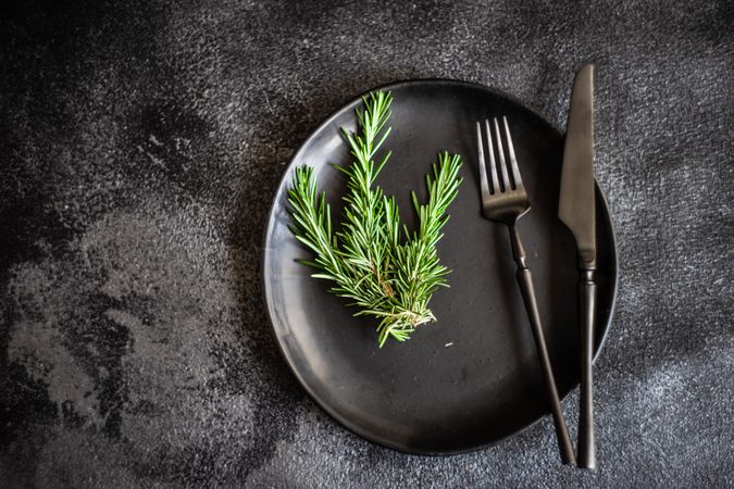 Table setting with rosemary sprigs