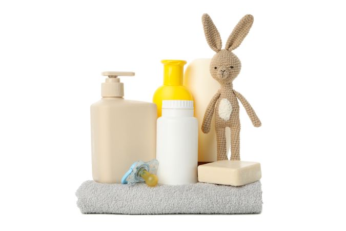 Baby hygiene accessories isolated on light background