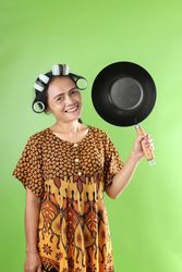 Asian Woman Holding Wok for Cooking Chinese Food.