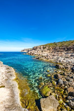 Cala Portinax bay with beautiful azure blue sea water