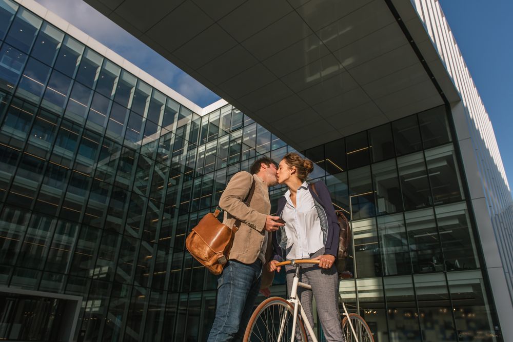 Couple kissing each other after work