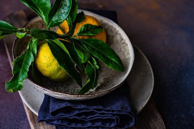 Holiday place setting with tangerines