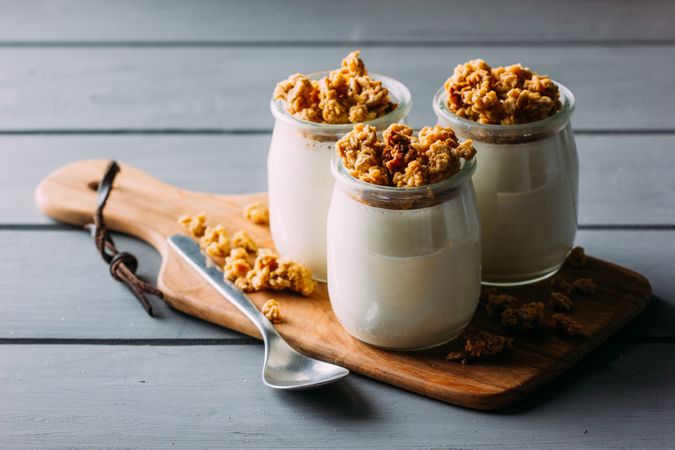 Glass bottles with milk and walnuts