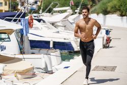 Man jogging on waterfront